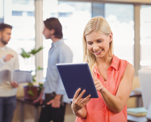 Woman engaging with social media on a iPad